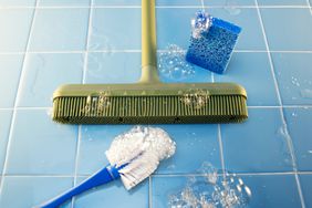 Cleaning a mop, broom, sponge and scrub brush