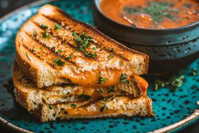 Grilled Cheese Sandwich with Tomato Soup on modern cermaic plate