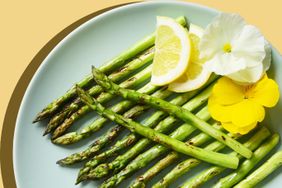 roast asparagus on blue plate