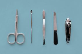 Manicure tools on a blue background