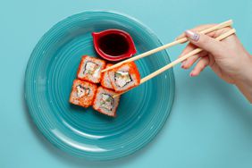 how-to-hold-chopsticks-GettyImages-1311747140