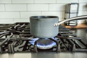 Gas stove flame on stovetop