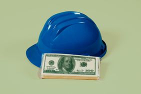 construction helmet and money