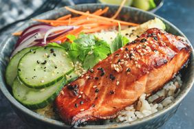 Spicy Salmon Bowl with Rice, Carrots, Cucumber and Avocado