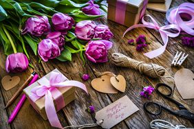 Preparing Mother's day gift on rustic table