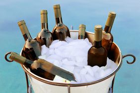 red-wines-to-serve-chilled: ice bucket of wine