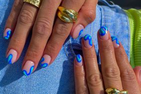 Short nails manicure with blue paint