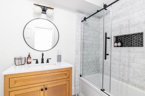 Small Bathroom with glass shower door